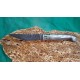 Coltello tipo pattadese con manicatura animata in corno buffalo fiammato