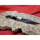 Coltello tipo pattadese  con manicatura animata in zoccolo di cavallo