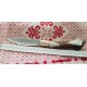 Coltello con manicatura in cervo sardo raffigurante maschera sarda
