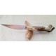 Coltello con manicatura in cervo sardo raffigurante maschera sarda